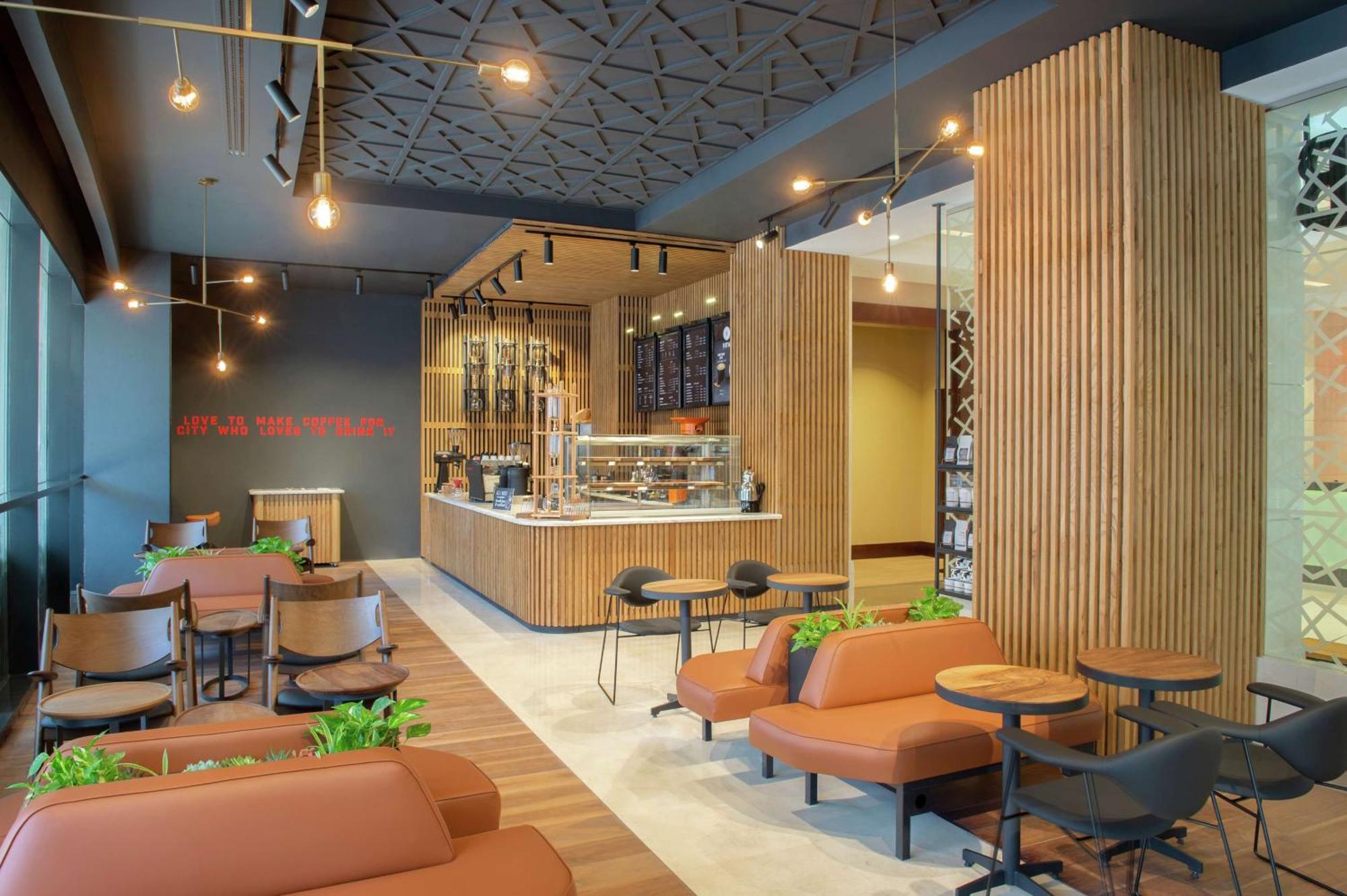 Doubletree By Hilton Doha - Al Sadd Ξενοδοχείο Εξωτερικό φωτογραφία Interior of a Starbucks Reserve store in Seoul, South Korea